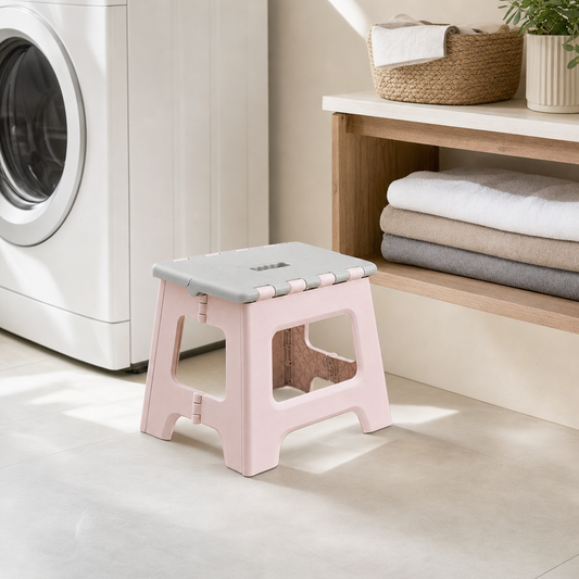 LIND Folding Chair lifestyle image for a calm laundry room setup.